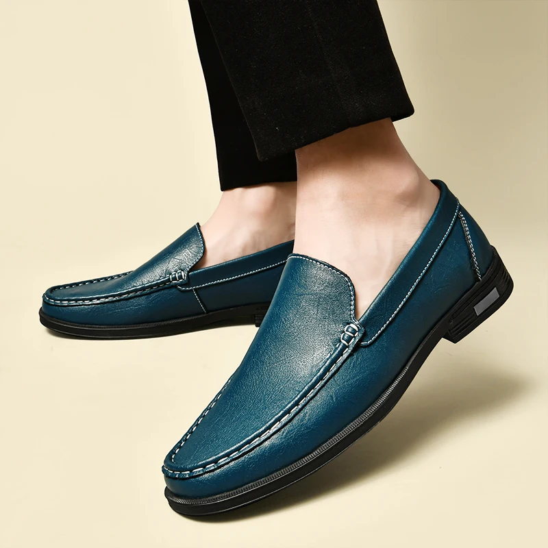 Men's elegant black leather slip-on loafers, perfect for formal or casual timeless style. Comfortable classic men's footwear.