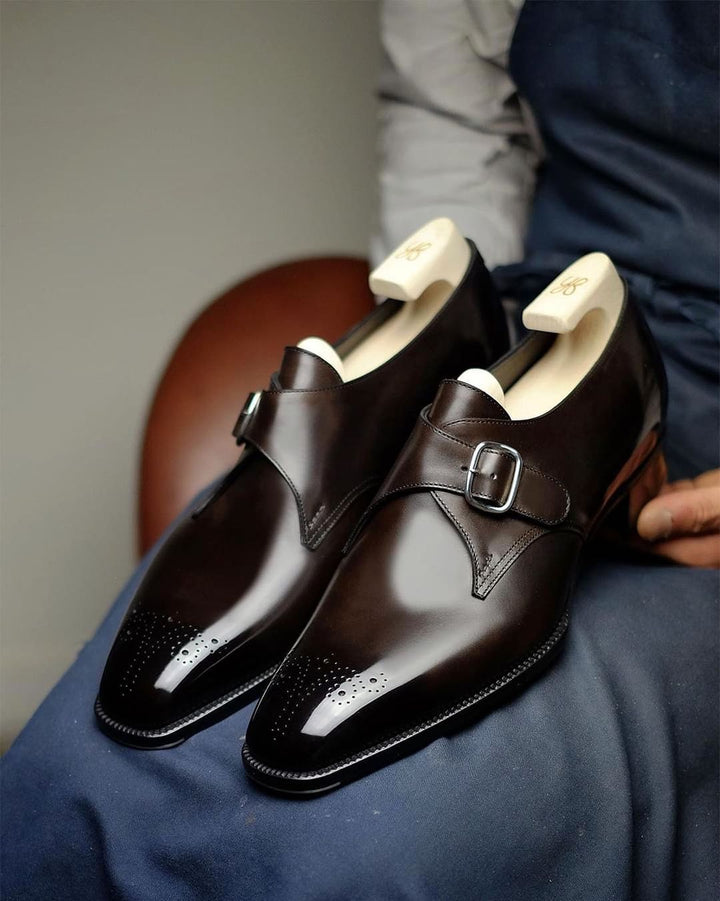 Men's elegant brown leather single monk strap dress shoes with a sleek buckle, perfect for formal & professional attire.
