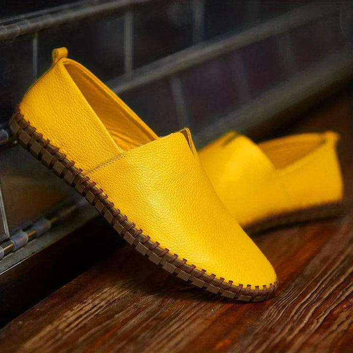 Dark blue matte slip-on loafers, men's comfortable dress shoes with a sleek design.