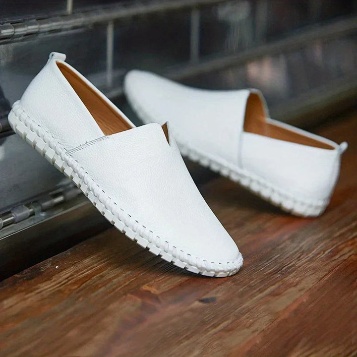 Classic black matte finish loafers, men's versatile slip-on shoes for any occasion.