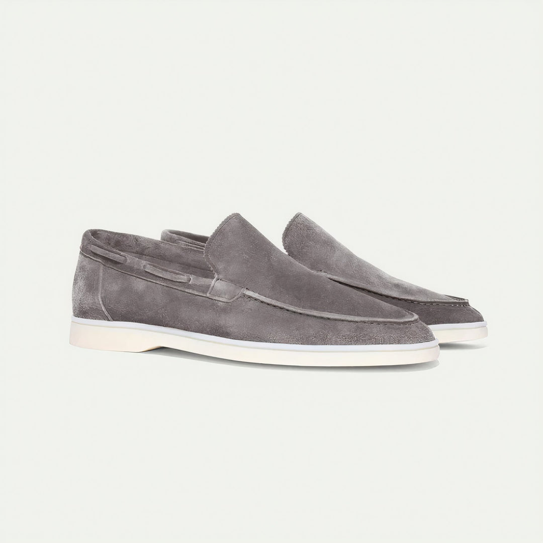 Navy blue men's suede loafers. Versatile slip-on shoes for elegant smart casual and business casual looks.