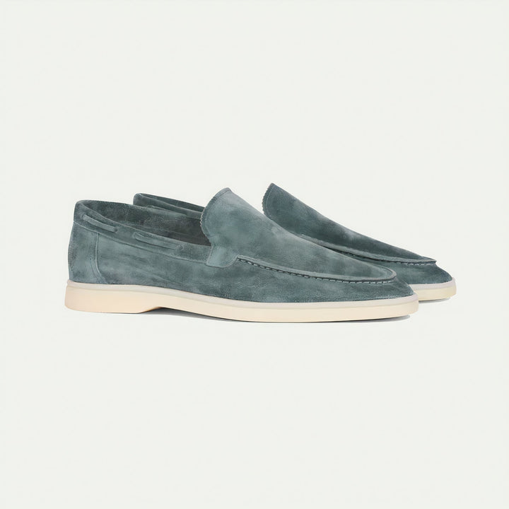 Light blue elegant suede loafers. Men's comfortable dress shoes for refined smart casual and business fashion.