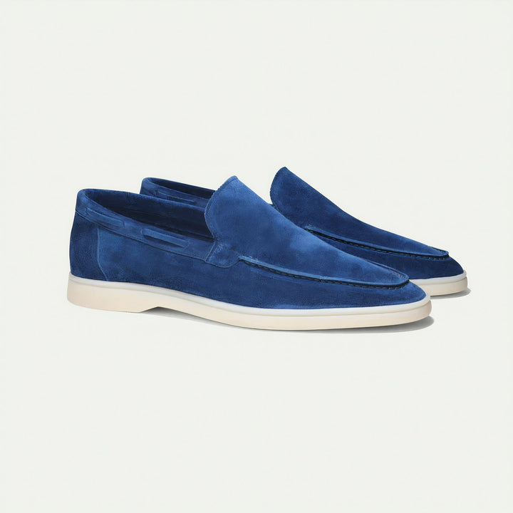 Navy blue suede loafers, elegant slip-on shoes for men's business casual and smart casual style.