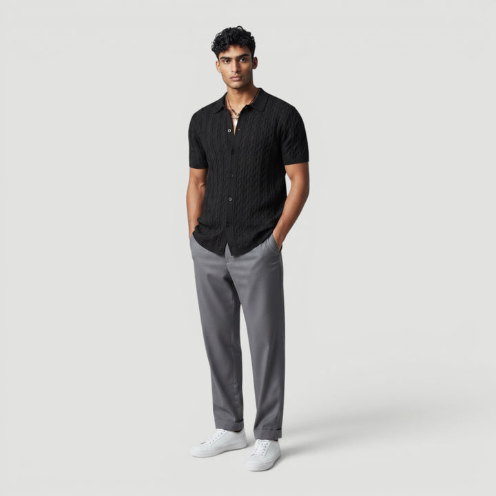 Men's elegant sleeveless sweater vest for casual chic layering.
