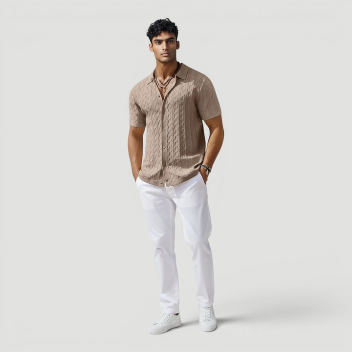 Soft knit men's sweater vest, ideal for elegant casual layering style.