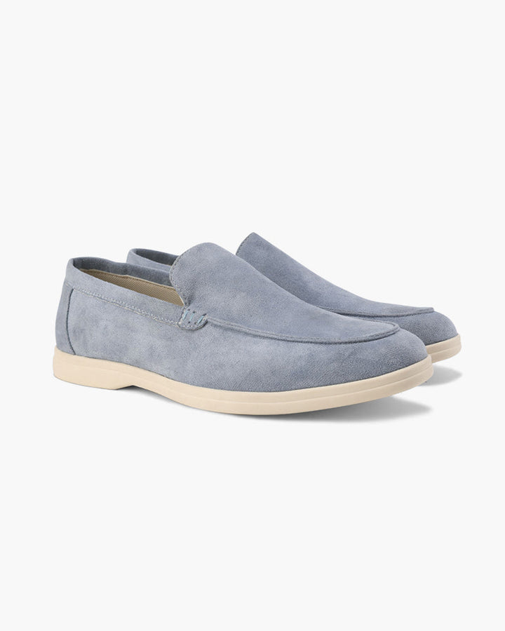 Step into refined style and effortless comfort with these modern men's slip-on loafers.