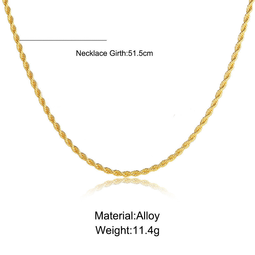 Stylish men's twisted rope chain necklace, worn to enhance a modern, elegant fashion look.