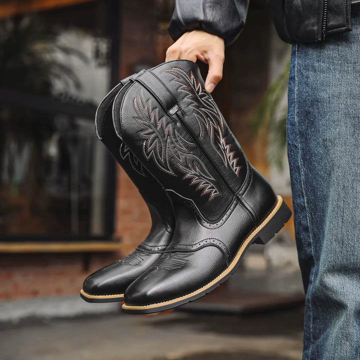 Stylish men's embroidered mid-calf boots worn, showcasing a smart-casual look for everyday comfort.