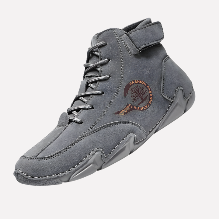 Rugged men's waterproof work boots. Ergonomic design, slip-resistant, durable for tough outdoor conditions & daily wear.
