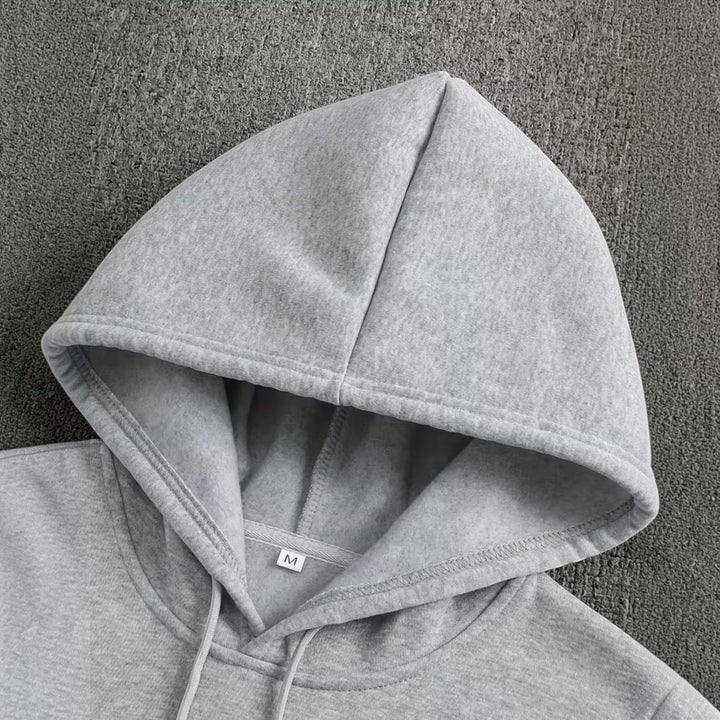 Maroon men's hooded sweatshirt, perfect for fall fashion & everyday comfort.
