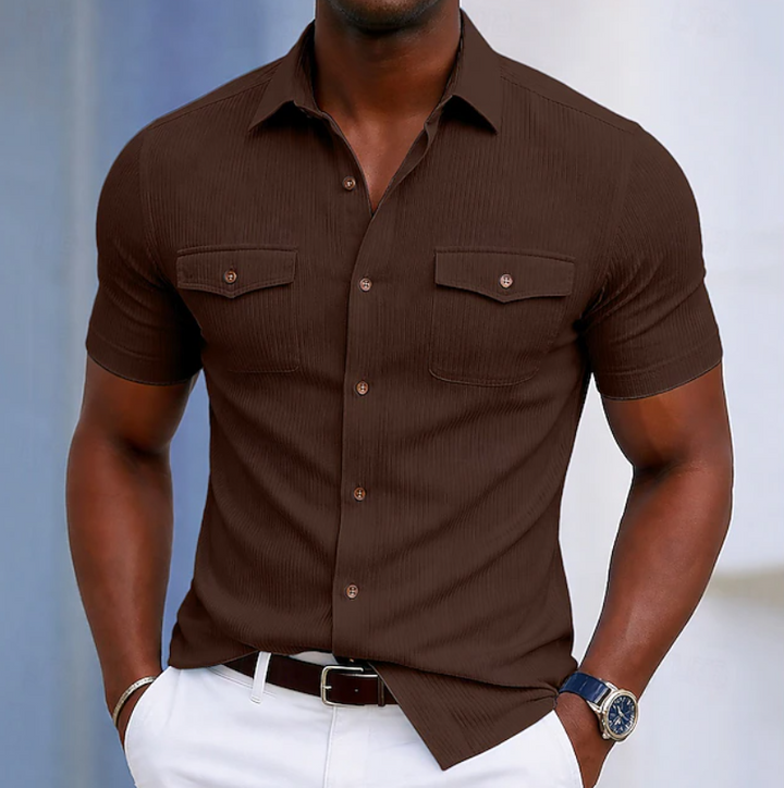 Front view of a men's everyday comfort short sleeve button-up shirt with a practical chest pocket. Modern menswear.