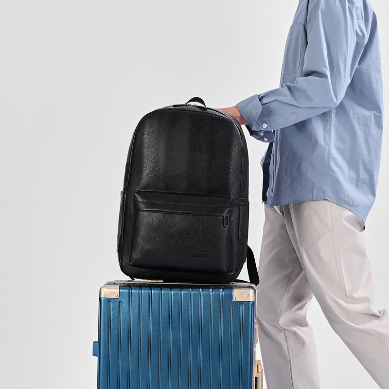 Men's executive leather backpack, perfect for business travel, fits laptop & documents. Stylish & professional.
