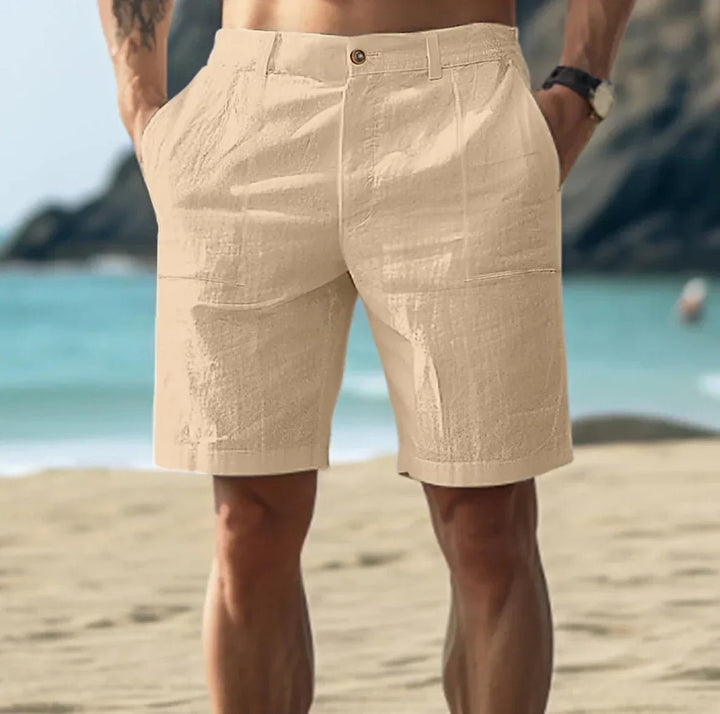 Stylish men's linen chino shorts with a flat front, offering a lightweight and relaxed fit for summer fashion.