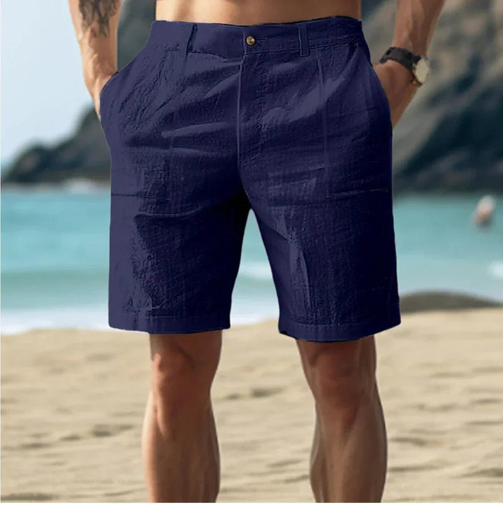 Lightweight men's flat front summer shorts made from breathable linen, essential for warm weather casual apparel.
