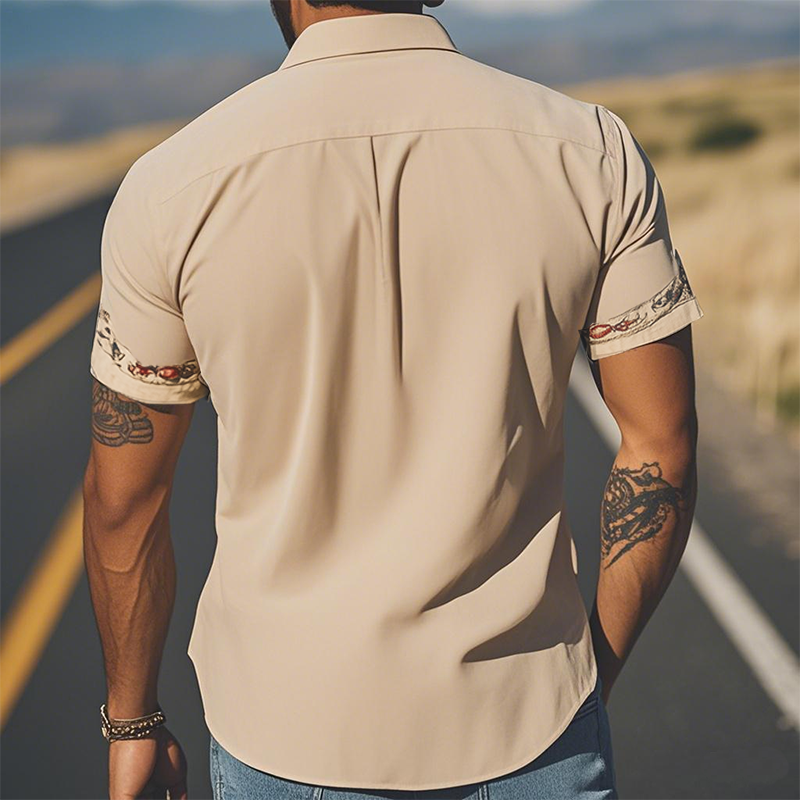 Stylish embroidered floral short sleeve men's casual shirt, unique design with button-up front.