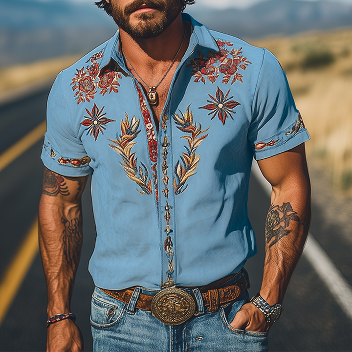Western-inspired men's floral embroidered short sleeve shirt, unique design for a refined casual look.