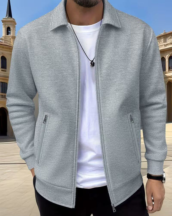 Stylish men's textured athletic jacket. Versatile full-zip outerwear for everyday fashion & comfort.
