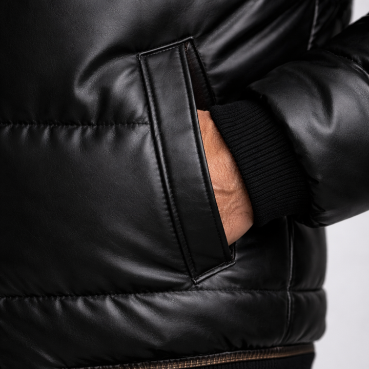 Stylish men's glossy black puffer jacket featuring a plush fur collar, a sleek and warm winter outerwear option.