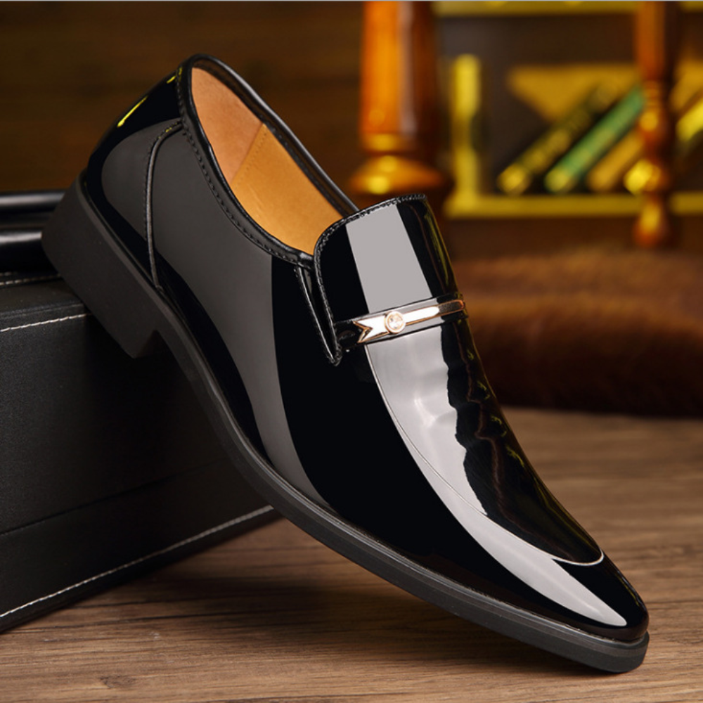 Men's glossy black slip-on dress shoes, perfect for formal business or wedding occasions.