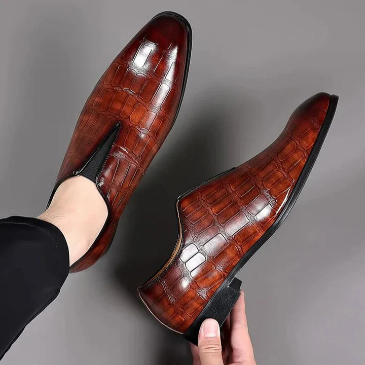 Stylish men's formal slip-on brogues with a glossy crocodile pattern, perfect for elegant events.
