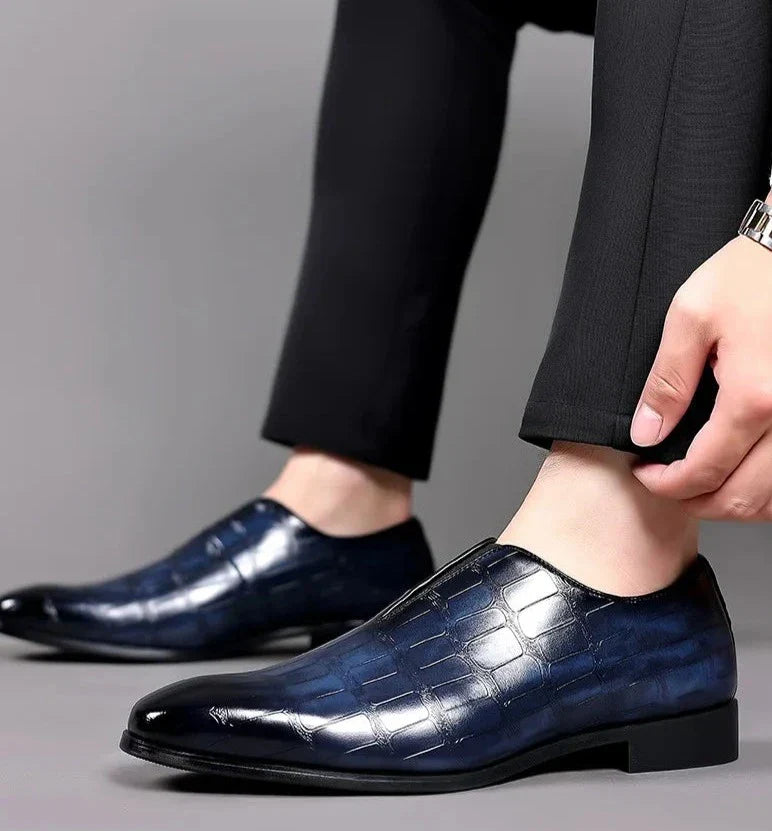 Fashionable men's glossy crocodile print slip-on brogues, a statement in men's footwear.