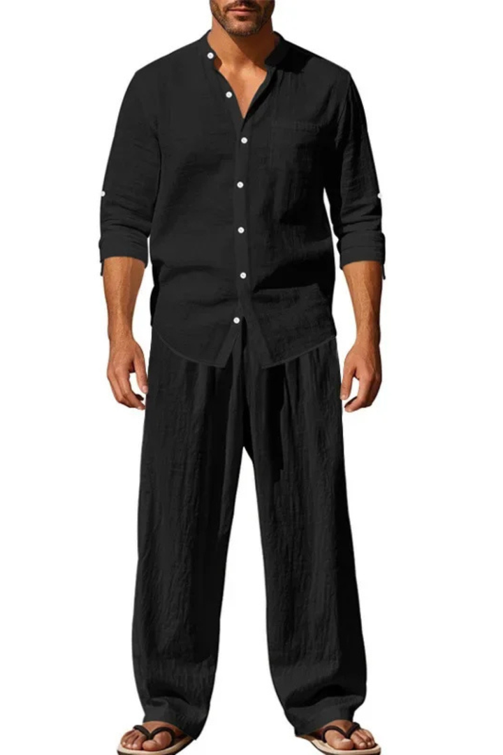 Stylish men's matching two-piece outfit featuring a grandad collar shirt and straight leg trousers.