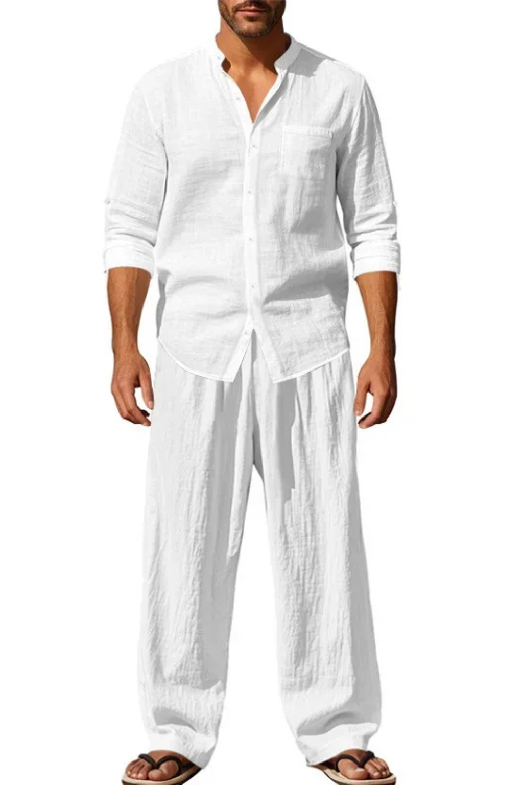 Model wearing a sleek men's grandad collar shirt and straight leg trousers, showcasing versatile style.