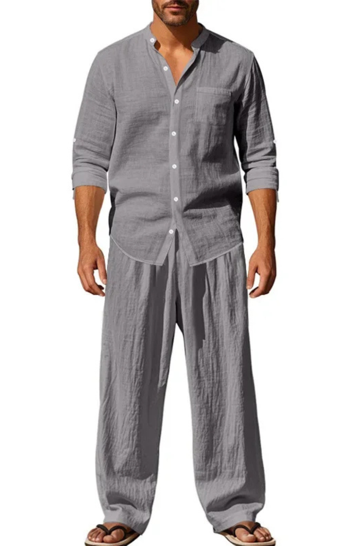 Full-length view of the men's summer outfit, a breathable grandad collar shirt and straight leg trousers.