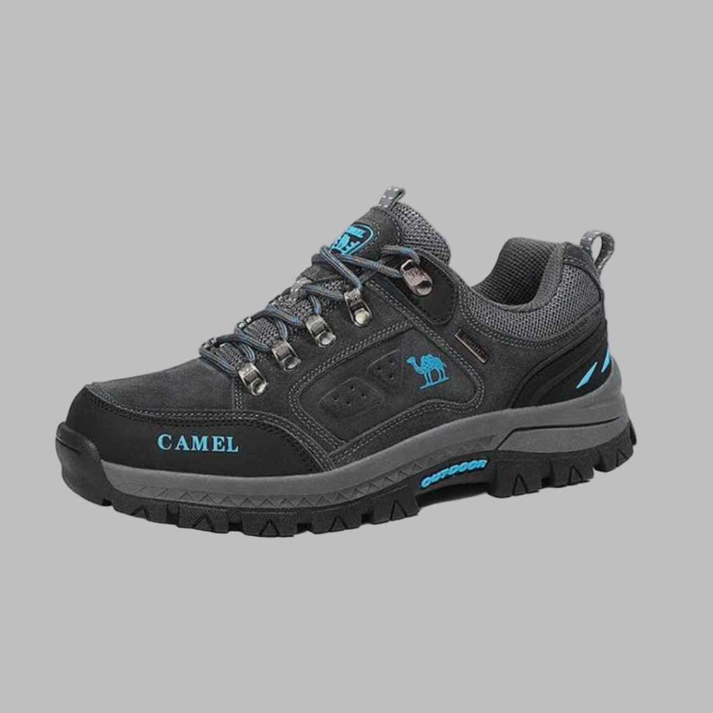 Men's grey waterproof hiking shoes for all-weather trail comfort. Durable outdoor footwear with non-slip grip.