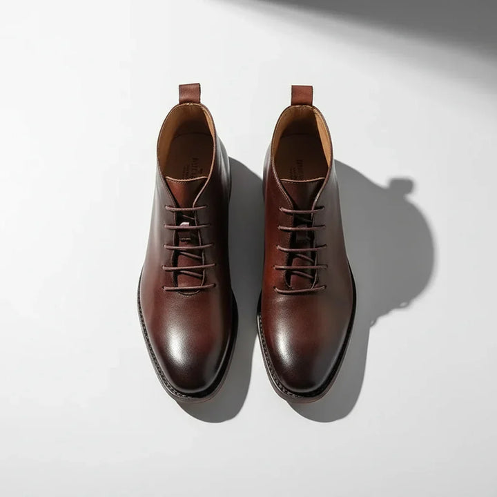 Durable men's black leather ankle boots with comfortable fit, ideal for timeless style & everyday wear.