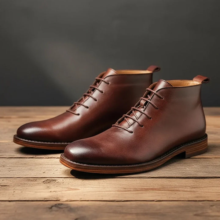 Hand-finished men's ankle boots in rich brown, offering comfort and stylish versatility for any occasion.