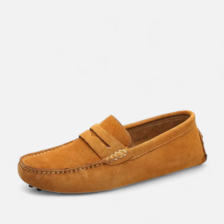 Close-up of premium leather men's loafers, handmade for a classic, sophisticated slip-on style.