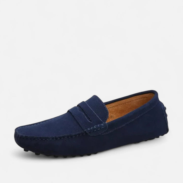 Front view of men's elegant black leather loafers, handmade with a timeless slip-on design.