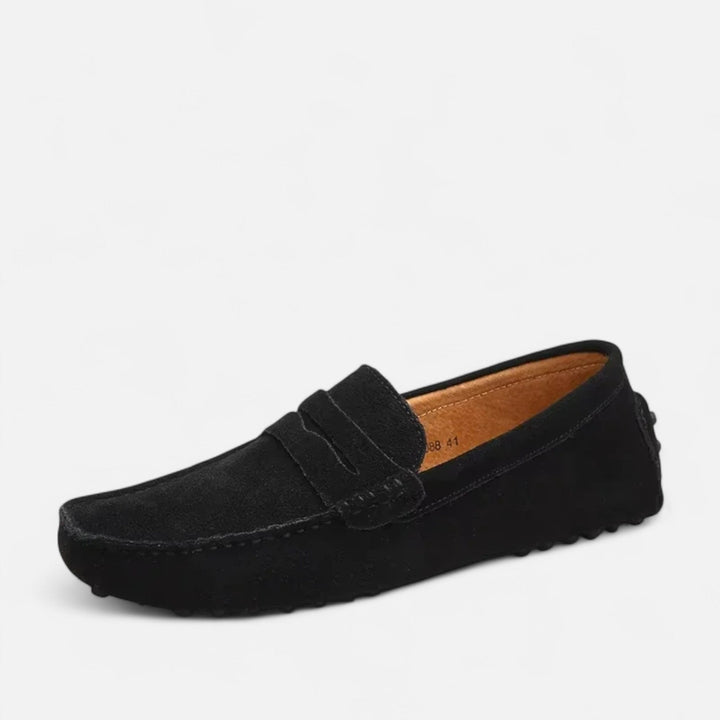 Stylish navy blue men's handmade loafers, comfortable slip-on shoes for classic everyday fashion.