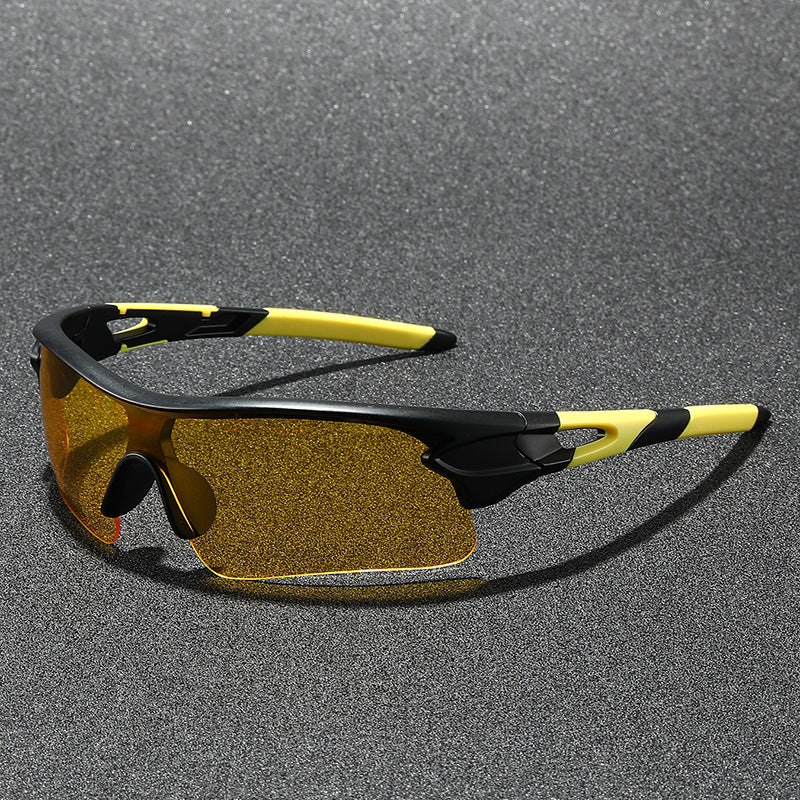 Black men's sport sunglasses with polarized UV protection, designed for athletic performance outdoors.