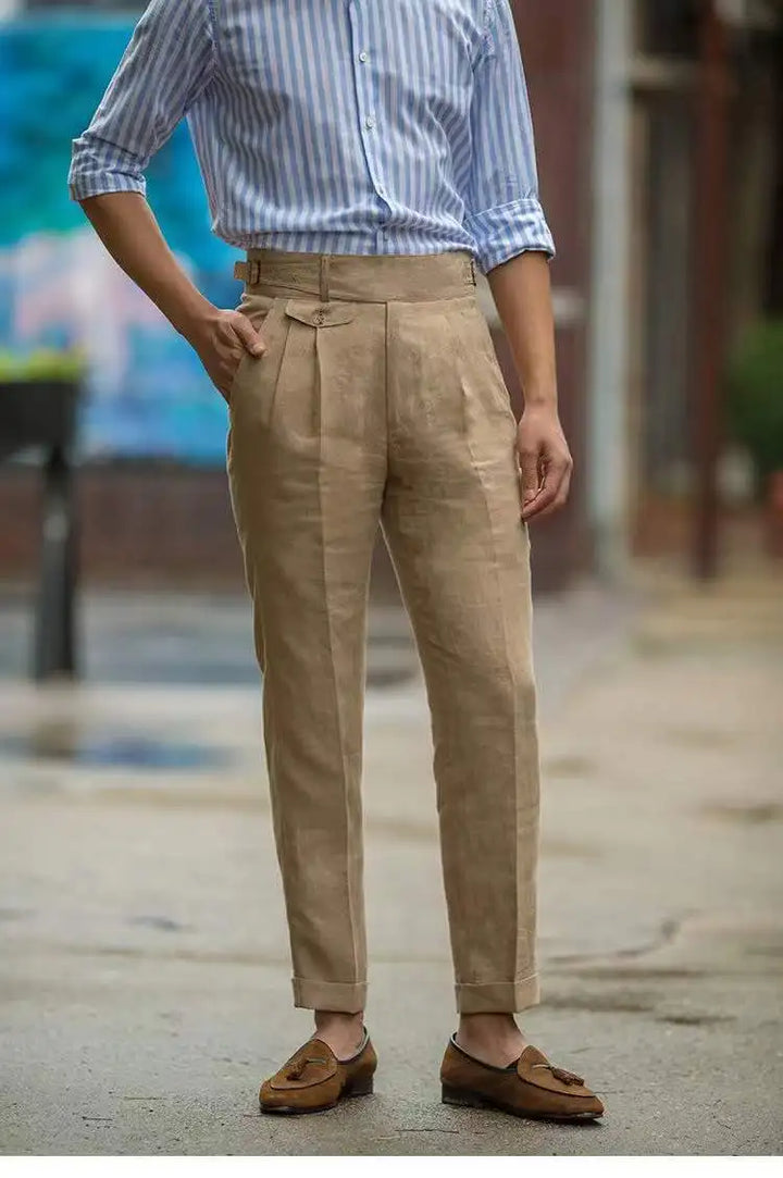 Close-up of men's tailored high waist trousers fabric, showcasing quality and elegant detail for modern summer style.