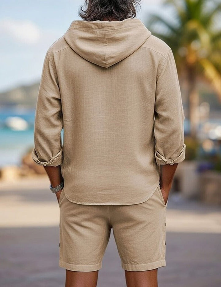 Comfortable men's relaxed fit linen two-piece set featuring a hooded shirt and matching shorts.