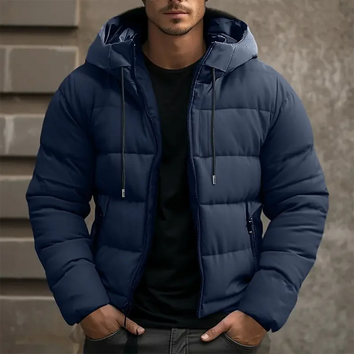 Durable men's outerwear: hooded puffer jacket designed for extreme cold conditions.