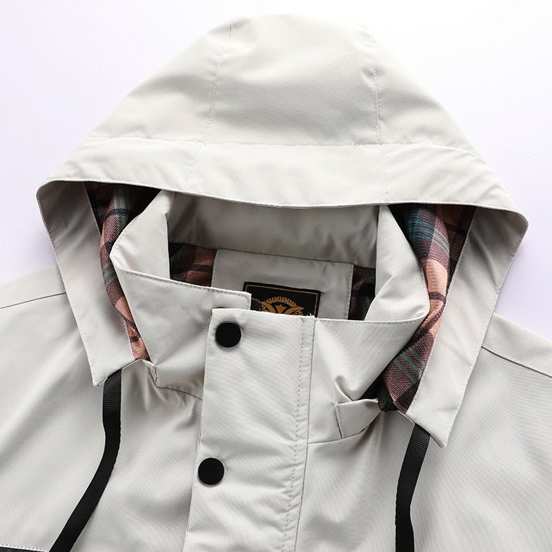 Men's multi-pocket hooded winter jacket with adjustable cuffs, comfortable & warm for cold weather.