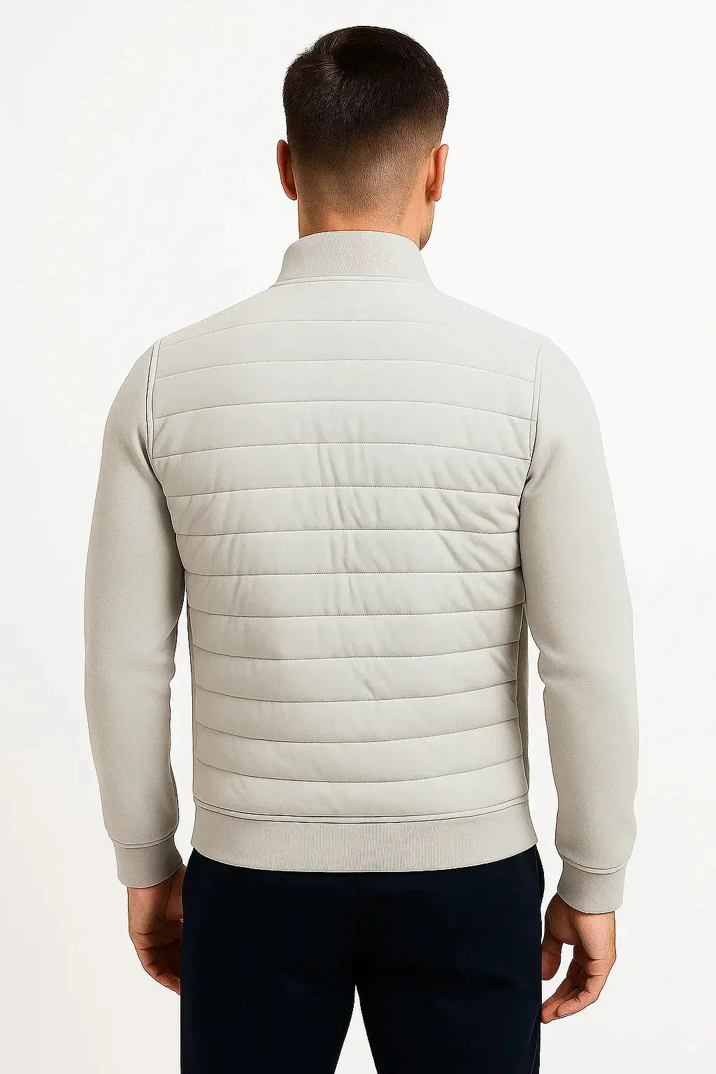 Men's fashion hybrid jacket. Quilted front & back, long knitted sleeves. Stylish and practical lightweight outerwear.