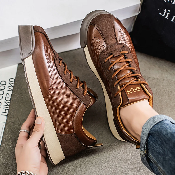 Men's Italian style fashion sneakers on feet. Versatile brown casual shoes for smart casual & everyday wear.