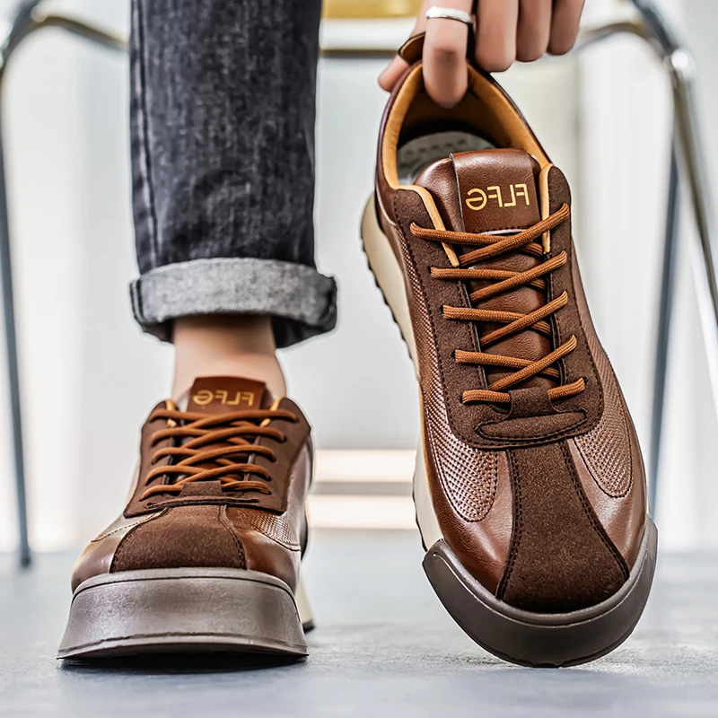 Side profile of men's Italian style brown sneakers. Stylish, comfortable, versatile footwear for everyday fashion.