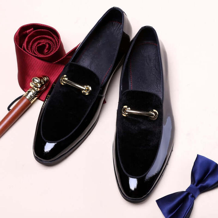 A pair of men's pointed toe slip-on dress loafers, the ultimate formal and wedding shoes.