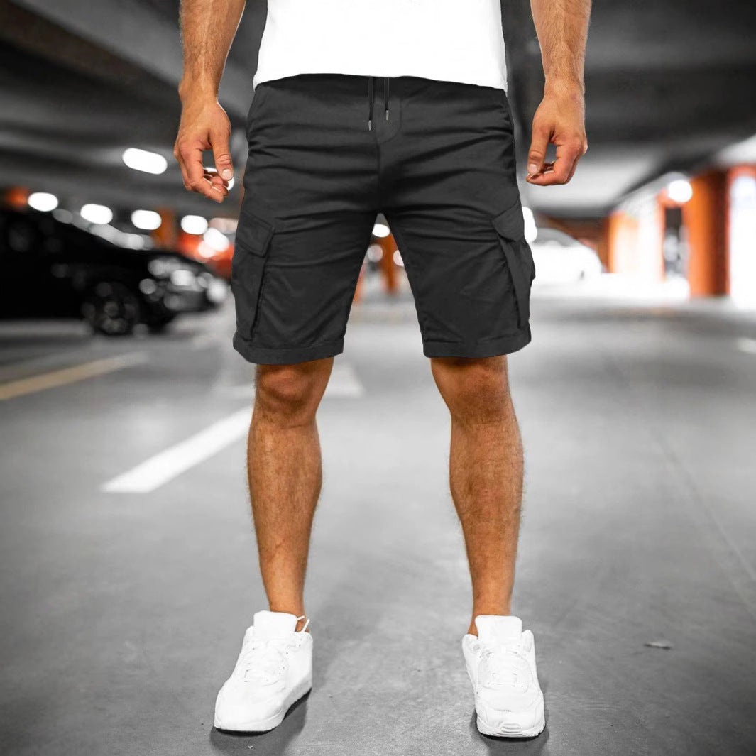 Men's khaki cargo shorts with multiple pockets & adjustable waist, great for versatile outdoor summer wear.
