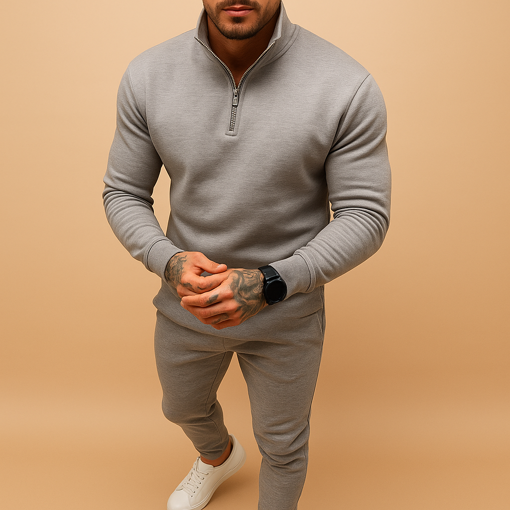 Stylish black men's half-zip loungewear set, featuring a pullover top & matching joggers.