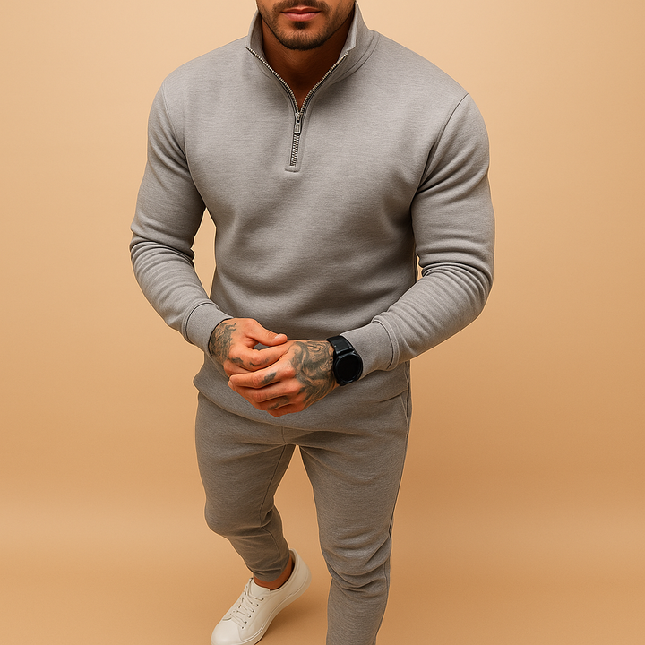 Stylish black men's half-zip loungewear set, featuring a pullover top & matching joggers.