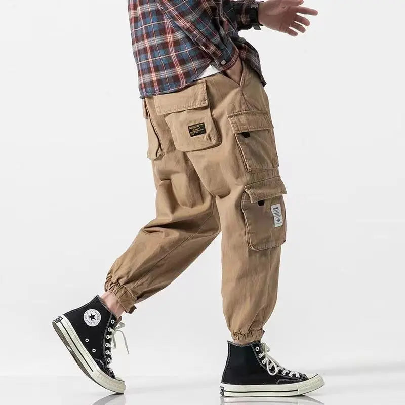Men's khaki tapered cargo pants. Versatile & durable for streetwear, casual & everyday comfort.