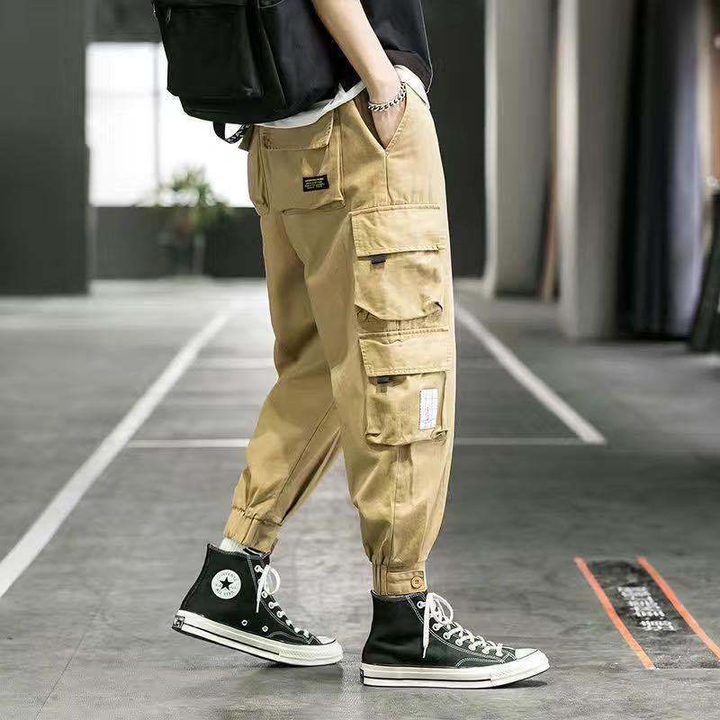 Black men's tapered cargo pants, ideal for comfortable everyday wear & modern utility style.