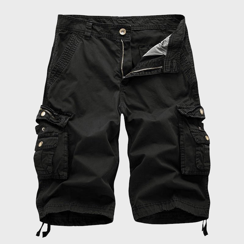 Close-up of men's knee-length cargo shorts, highlighting multiple functional pockets and comfortable drawstring hems.