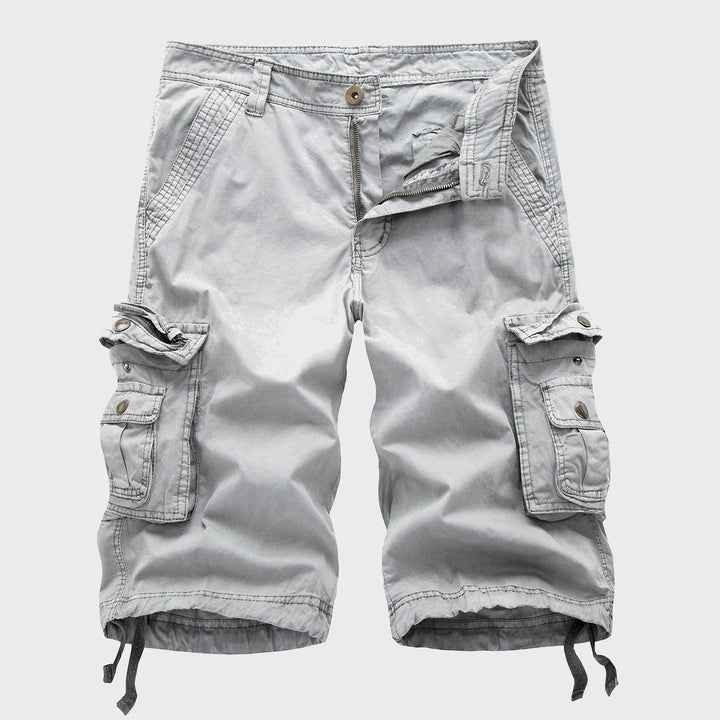 Stylish men's knee-length multi-pocket shorts, perfect for summer activities, casual outings, and relaxed comfort.